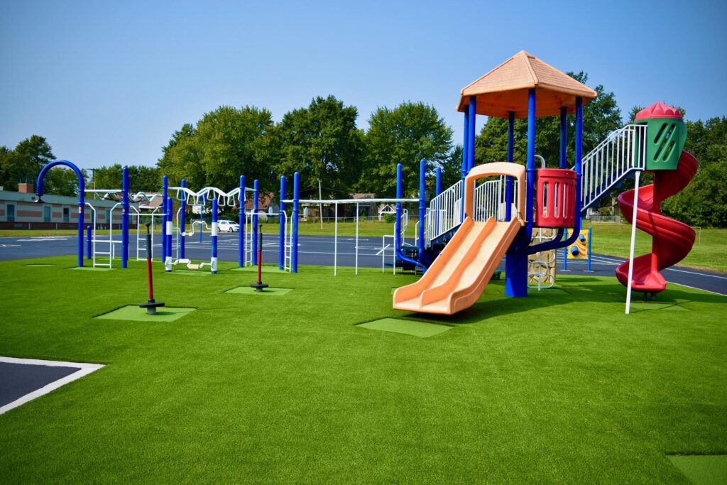 playground with artificial grass and padding