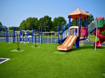 playground with artificial grass and padding